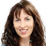 woman looking at the camera and smiling